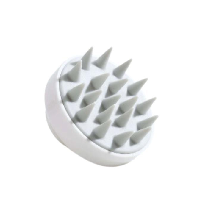 Brosse massante et stimulante cuir chevelu