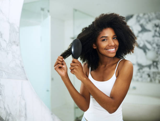 Démêler ses cheveux bouclés sans casse